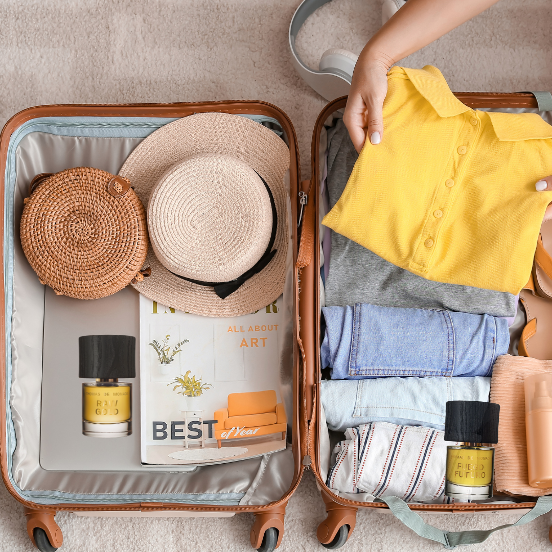 Koffer der gepackt wird u.a. mit Nischendüften von Thomas de Monaco