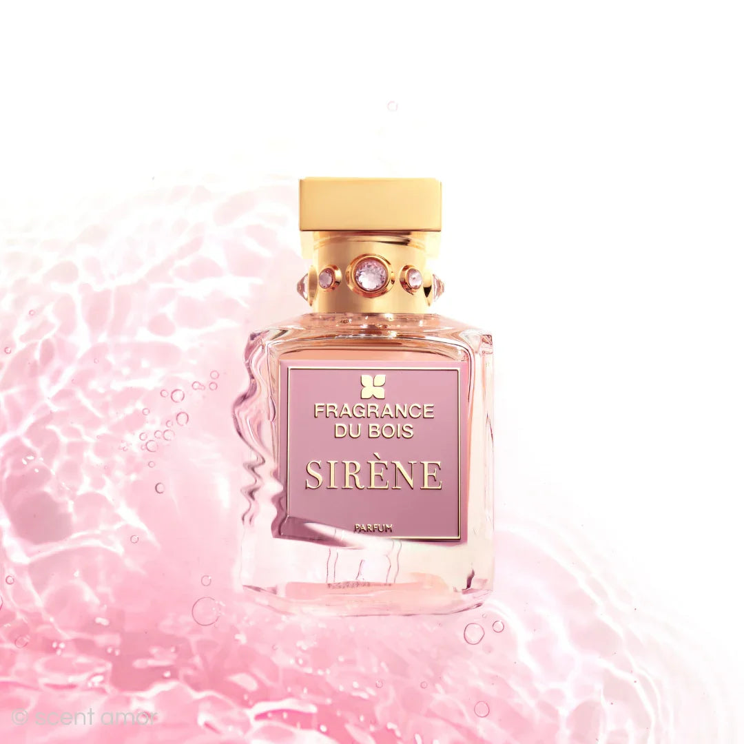 Luxus-Parfümflasche "Sirène" von FRAGRANCE DU BOIS mit goldenem Verschluss und rosa Etikett, verziert mit Schmucksteinen.