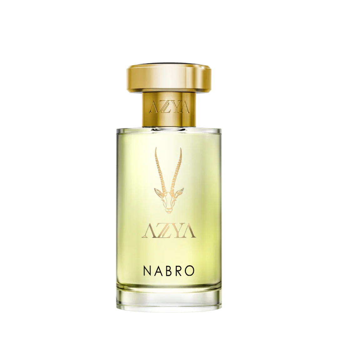 Parfümflasche "Nabro" von Azya mit goldener Kappe und einem Bild einer Antilope auf dem transparenten Glas.
