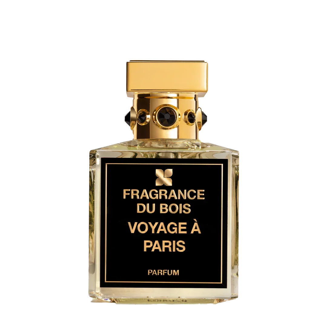 Klares Glasparfum mit schwarzem Etikett, goldener Kappe und "Voyage à Paris"-Aufschrift von FRAGRANCE DU BOIS.