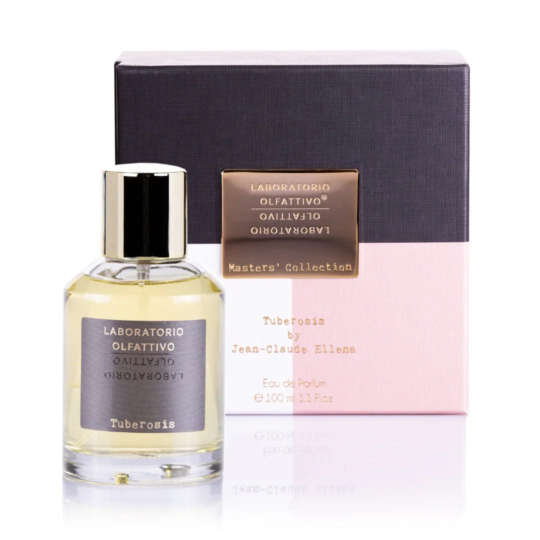 Parfümflasche "Master Collection Tuberosis" von Laboratorio Olfattivo, transparent mit goldfarbenem Deckel, daneben passende Box.