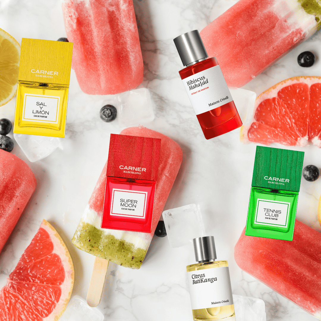 Wassereis am Stil mit Zitrusfrüchten und farbigen Nischenduft Flacons Carner Barcelona und Maison Crivelli