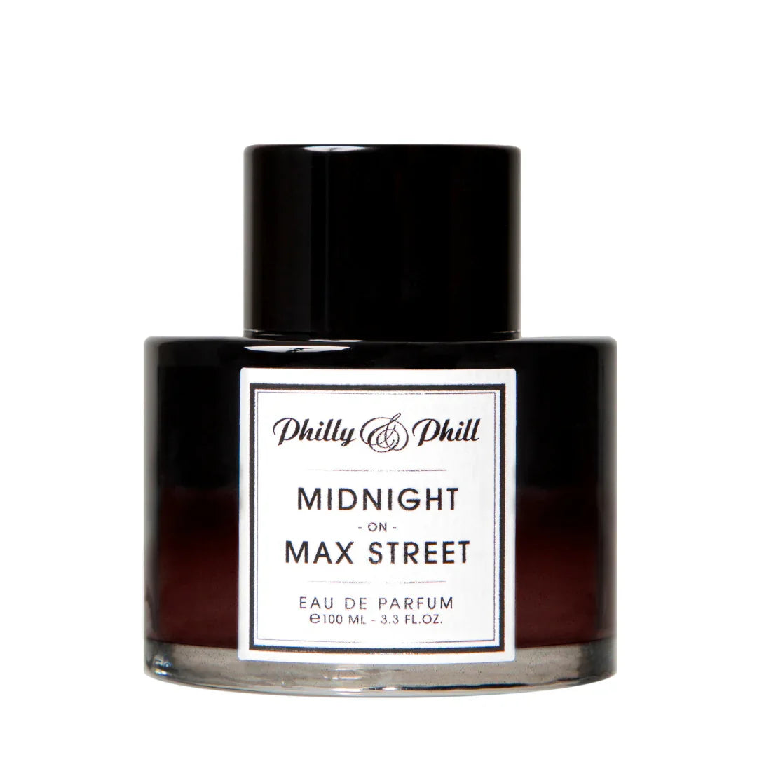 Parfümflakon "MIDNIGHT ON MAXSTREET" von Philly & Phill, zylindrische Form mit schwarzem Deckel und Etikett.
