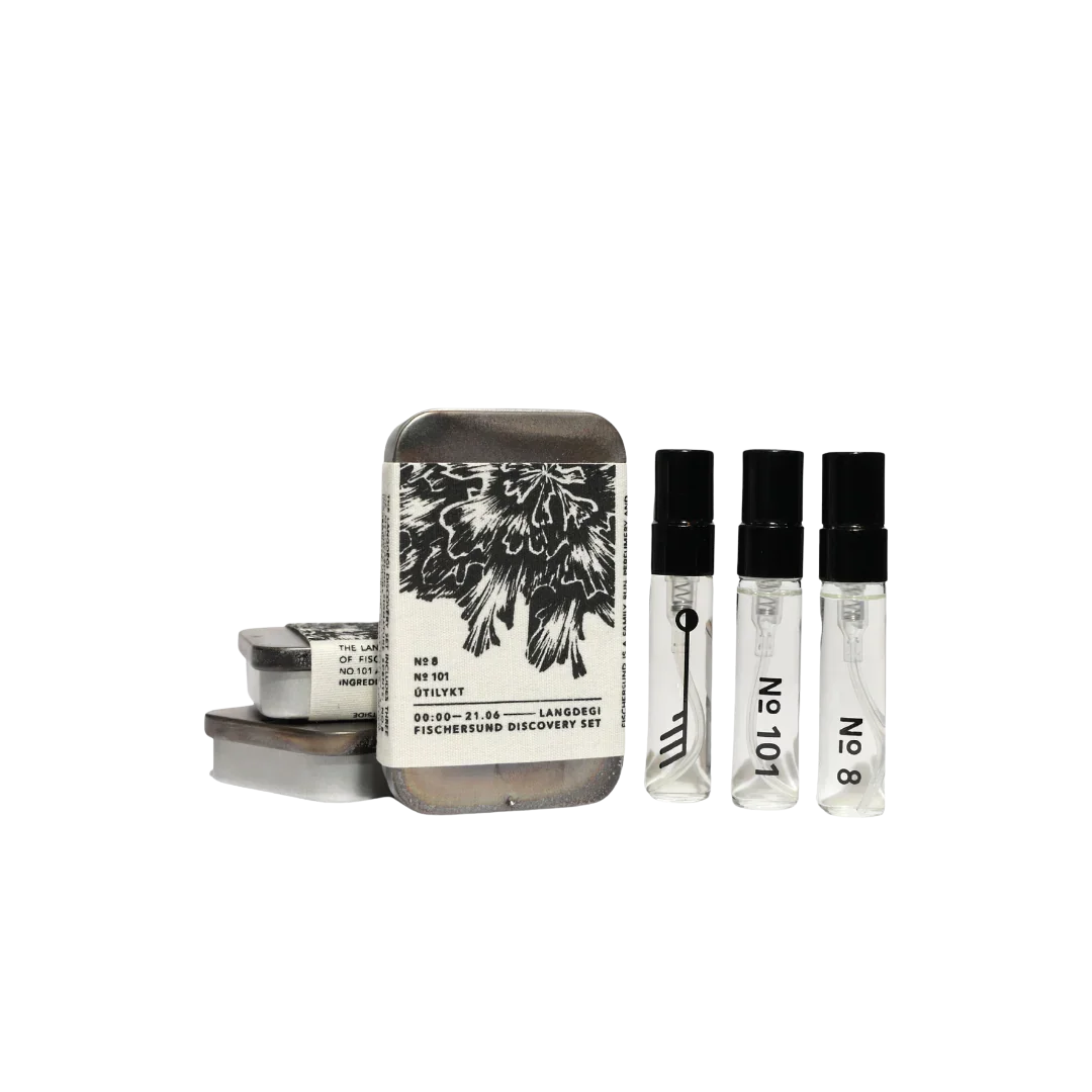 Langdegi Discovery Set von Fischersund, bestehend aus vier Parfümproben in Sprühflaschen und einer dekorativen Dose.