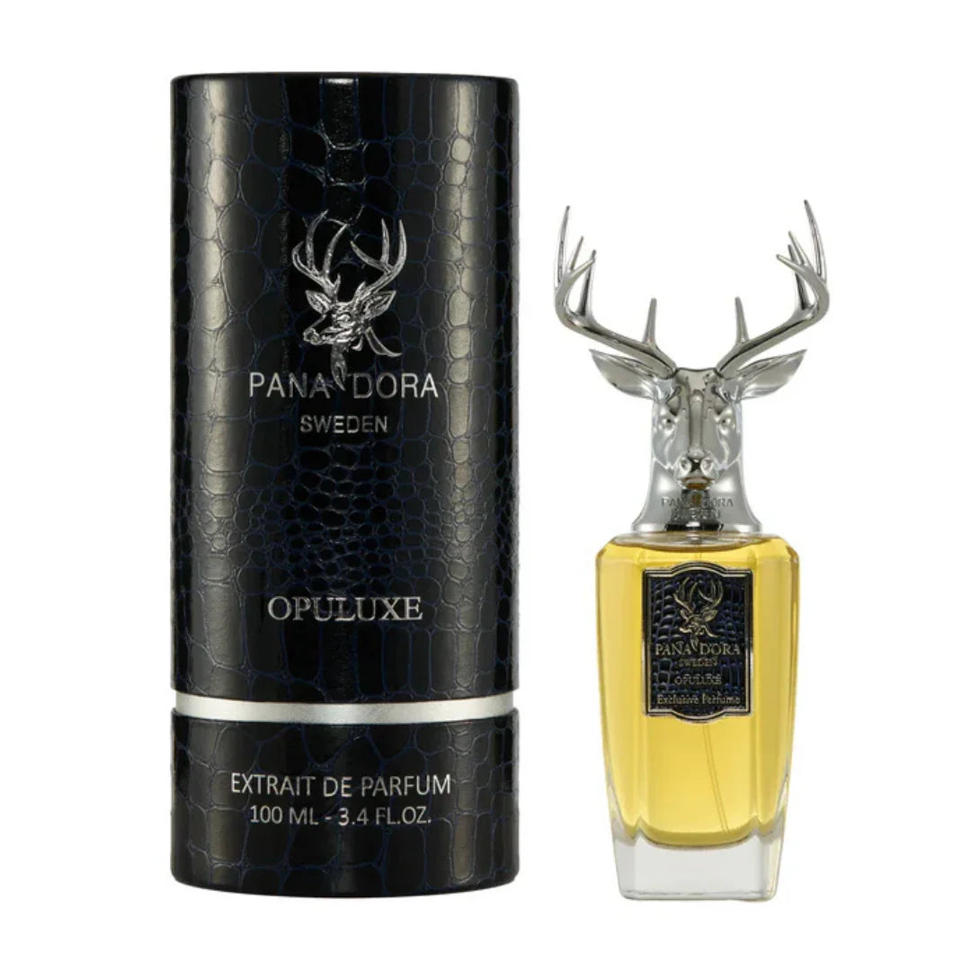 Schwarze, zylindrische Parfümschachtel von Pana Dora, neben einem Flakon mit Hirschkopfverschluss und goldenem Duftmittel, Opuluxe.