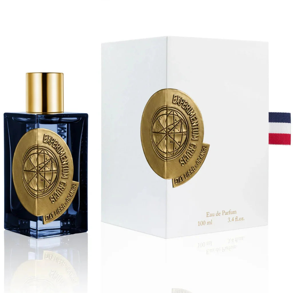 "Experimentum Crucis" von Etat Libre D'Orange: Dunkelblaue Glasflasche mit goldfarbener Verzierung, weiße Box.