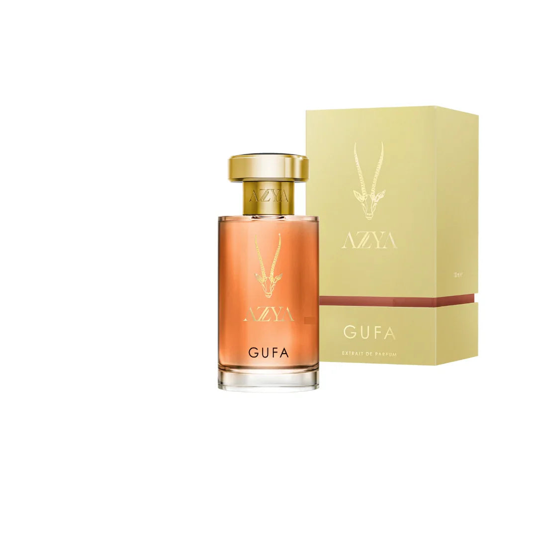 Parfümflasche "Gufa" von Azya neben passender Verpackung, beide in elegantem Design mit goldenen Details.