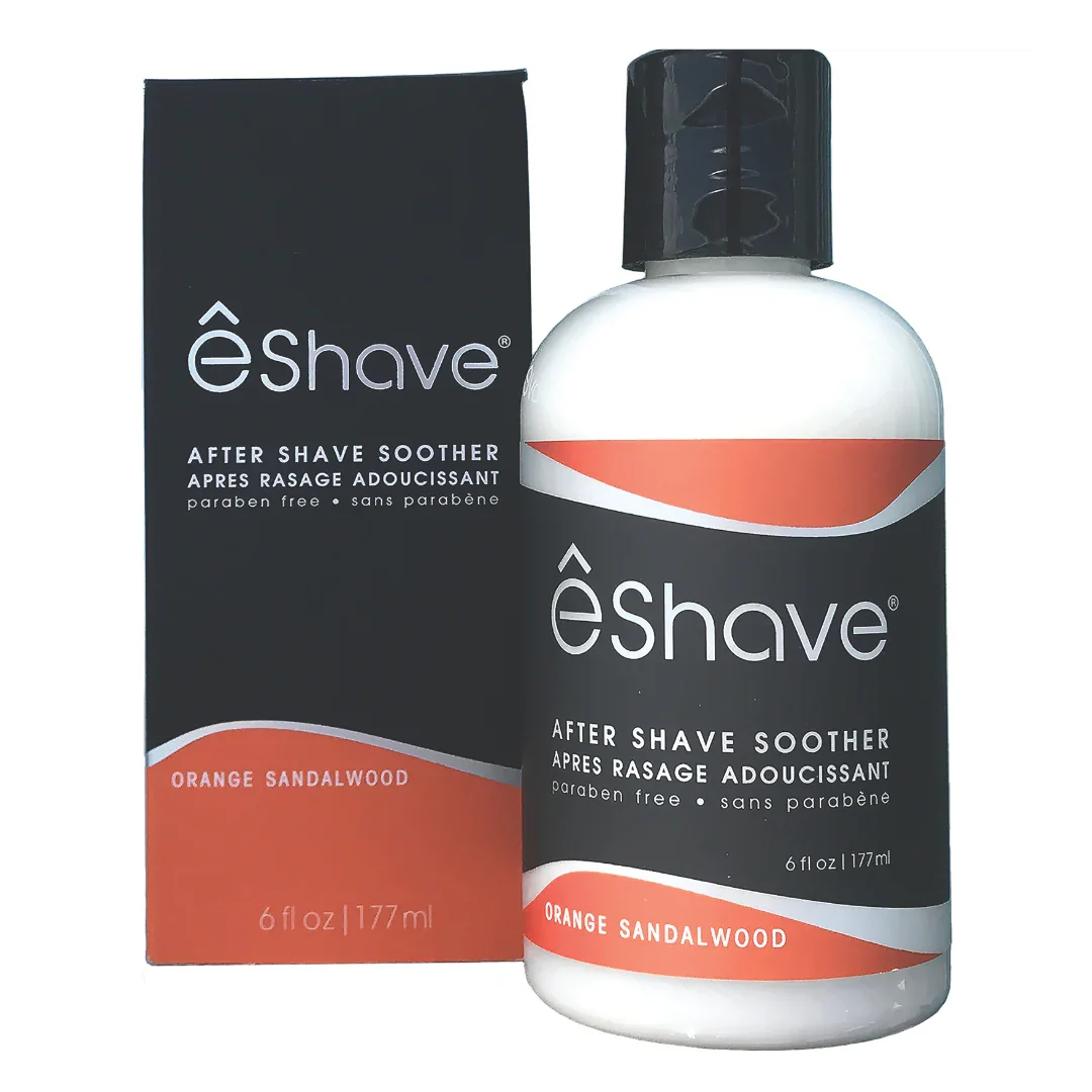 Flasche "Lotion Orange Sandalwood" von eShave mit schwarzer Kappe, schwarzem Etikett und orangefarbenem Akzent, neben passender Verpackung.