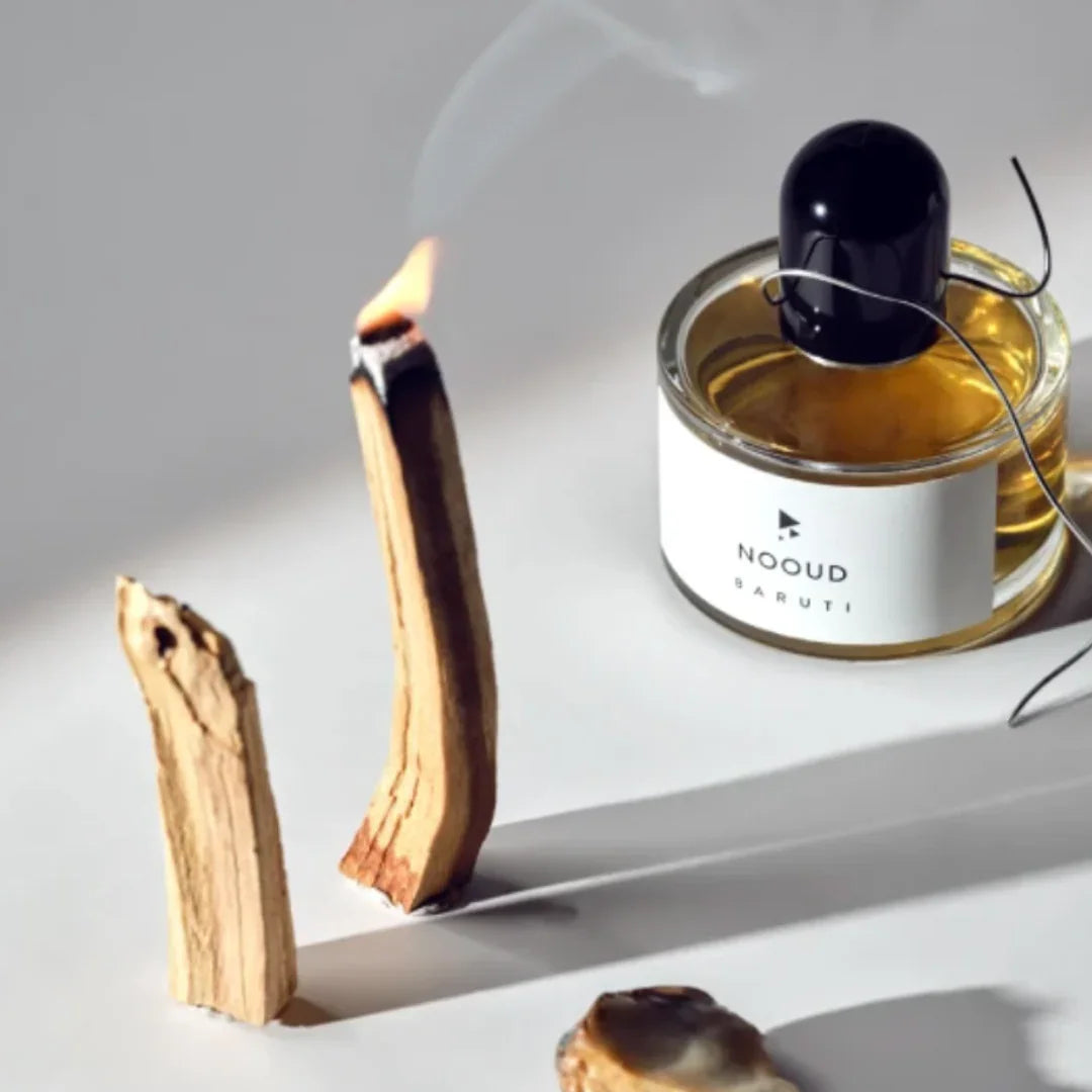 baruti nooud flakon neben brennendem holz