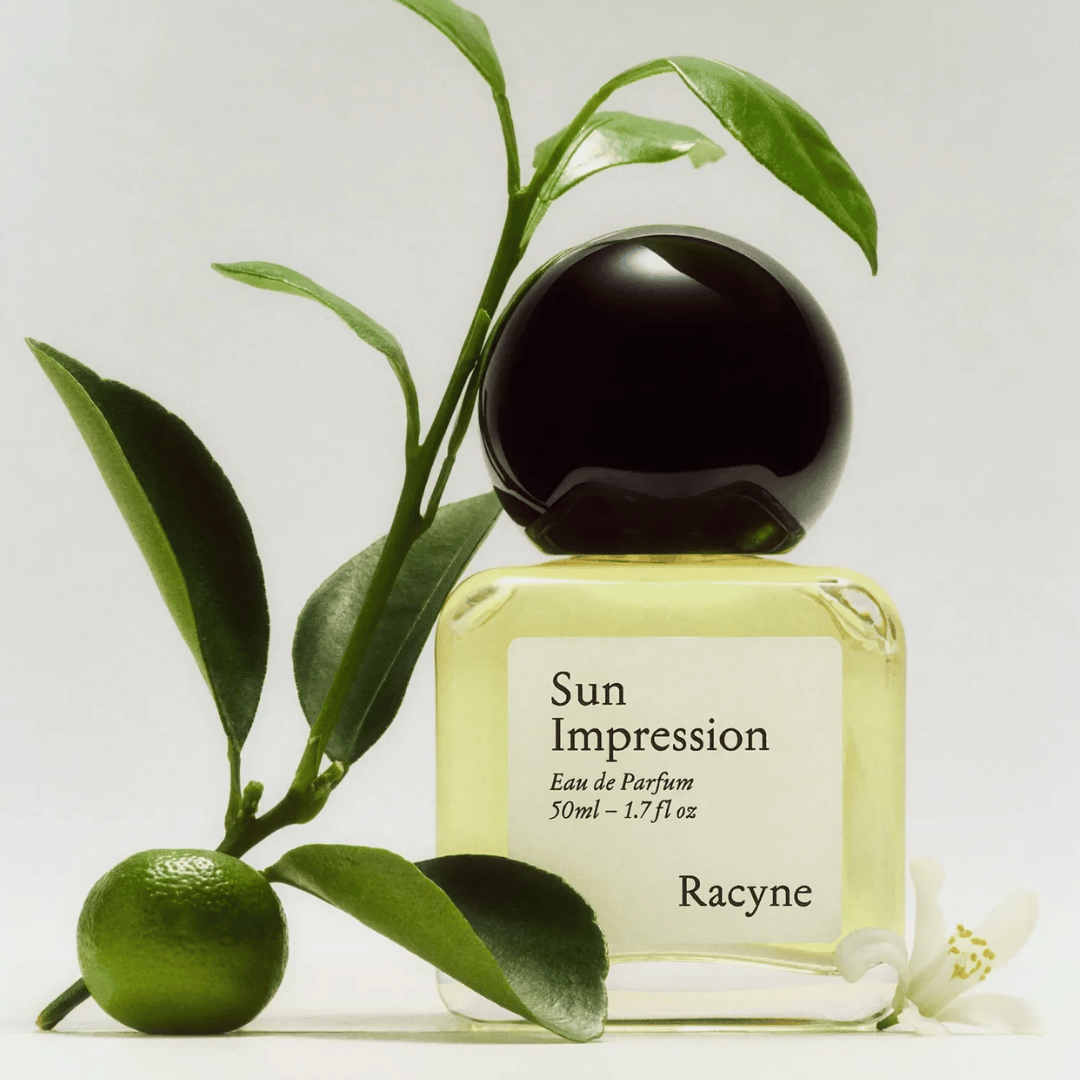 Racyne SUN IMPRESSION Eau de Parfum mit Zwei mit grünen Blättern bei scent amor Fachmann für feine Nischenparfums