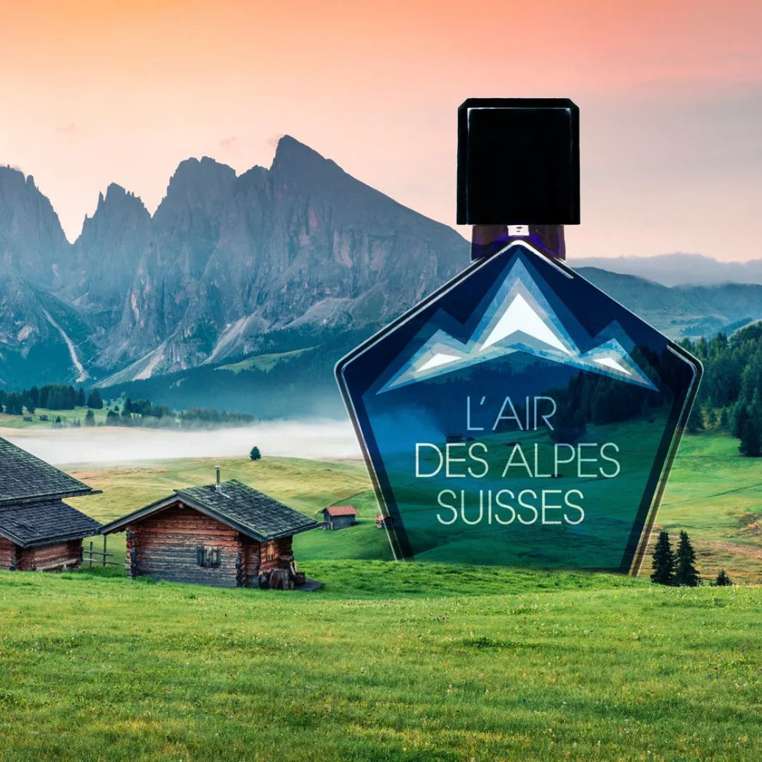 tauer perfumes l'air des alpes suisses flakon auf einer wiese vor den alpen