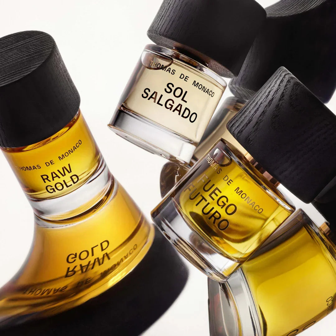 Thomas De Monaco Raw Gold, Sol Salgado und Fuego Futuro Flakons verzerrt- Nischendüfte als Eau de Parfum erhältlich bei scent amor