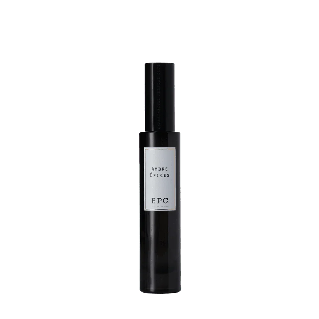 Schwarzer, zylindrischer Flakon mit der Aufschrift "Ambre Epices" und "EPC" von Experimental Perfume Club.