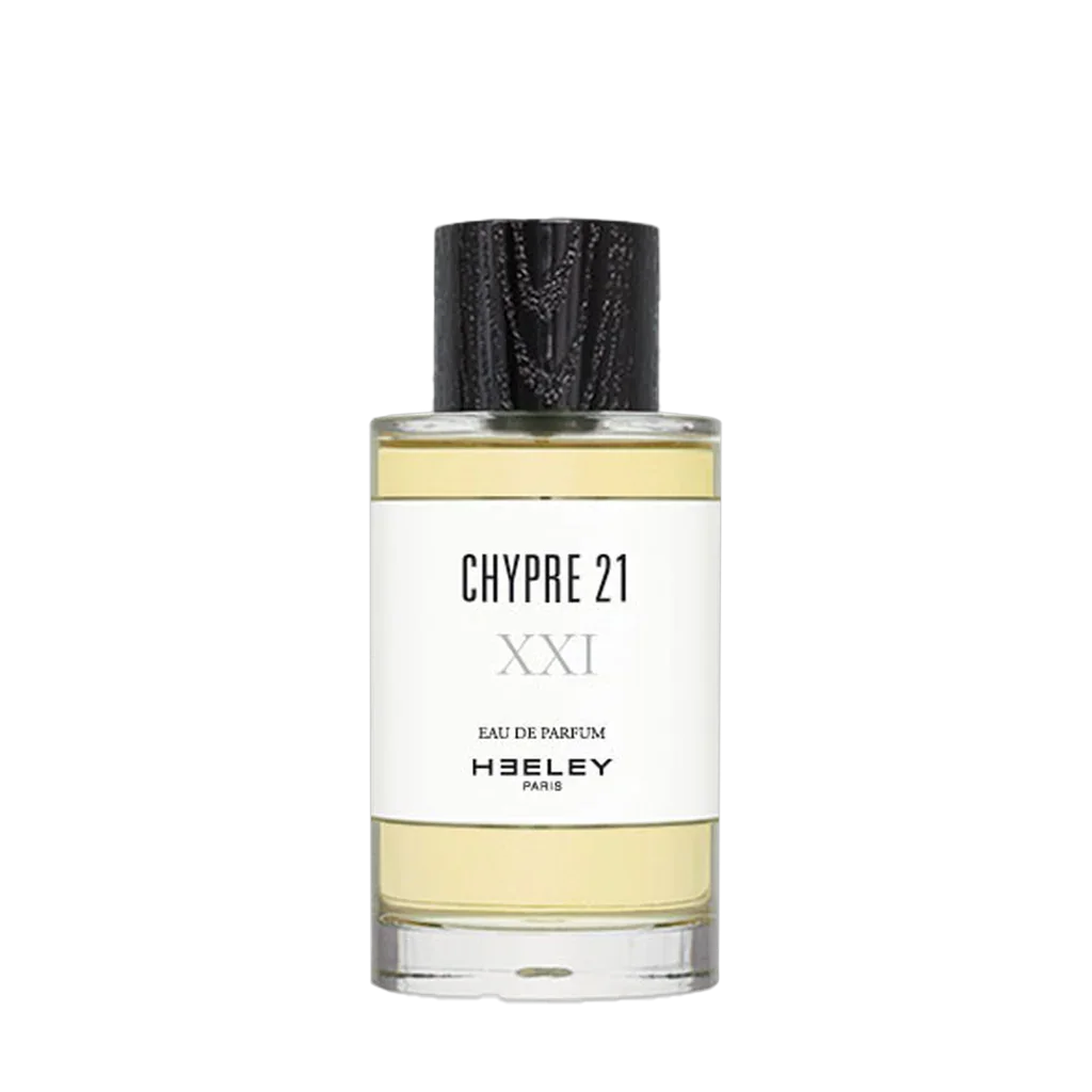 Klarglasflakon mit schwarzer Kappe, "CHYPRE 21 XXI" Aufschrift auf weißem Etikett. Marke: Heeley.