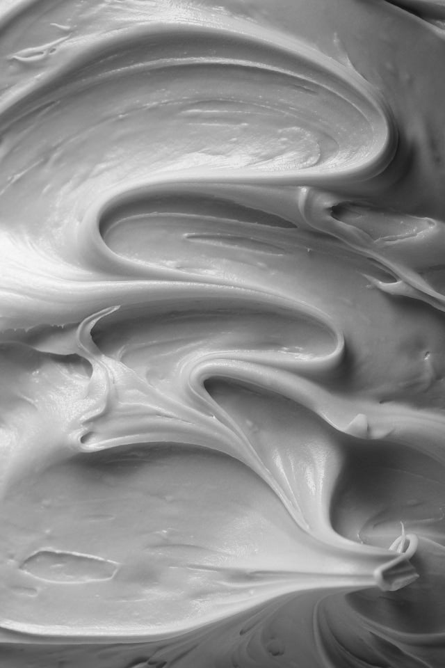 Nahaufnahme von Zuckerguss zur Darstellung der Duftfamilie "Gourmand".