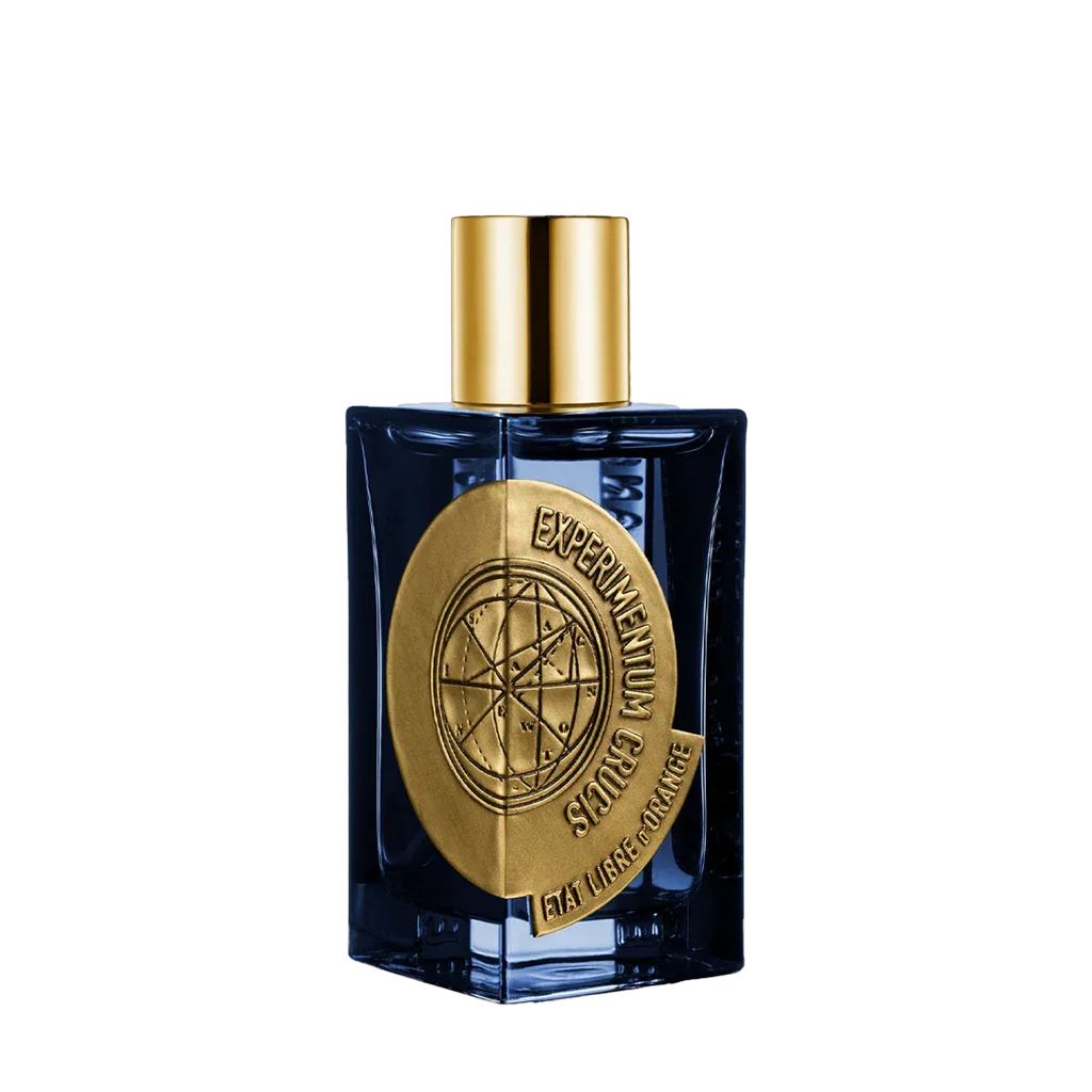 Parfümflakon "Experimentum Crucis" von Etat Libre D'Orange: Transparenter Flakon mit goldfarbenem Emblem und Verschluss.