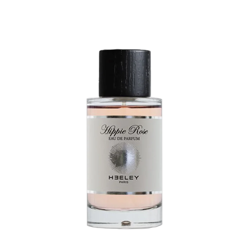 Transparente Flasche mit schwarzem Verschluss, Etikett mit dem Titel "Hippie Rose" und dem Hersteller "Heeley".