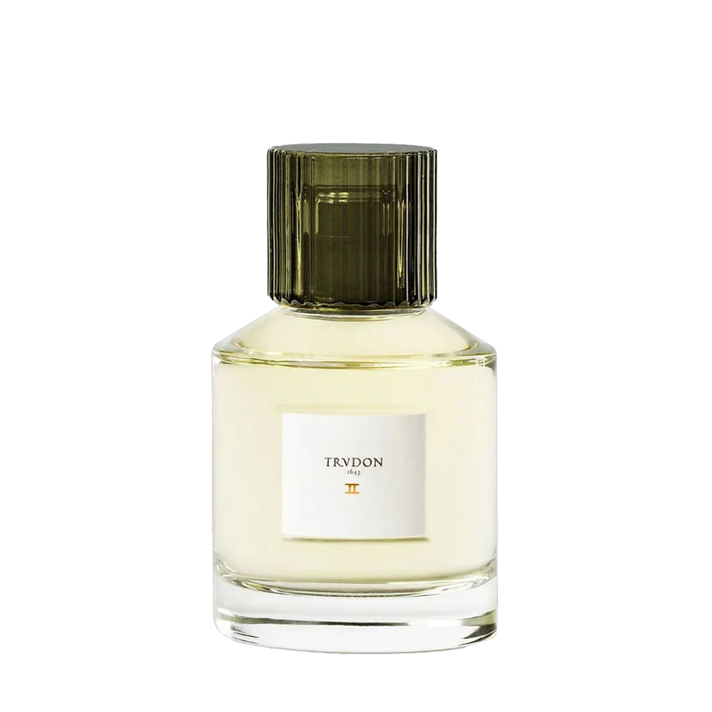 Parfümflakon "II" von Trudon mit zylindrischem Glasdesign und einem dunkelgrünen geriffelten Verschluss. Präsentiert von scent amor und seinem Kurator Georg R. Wuchsa