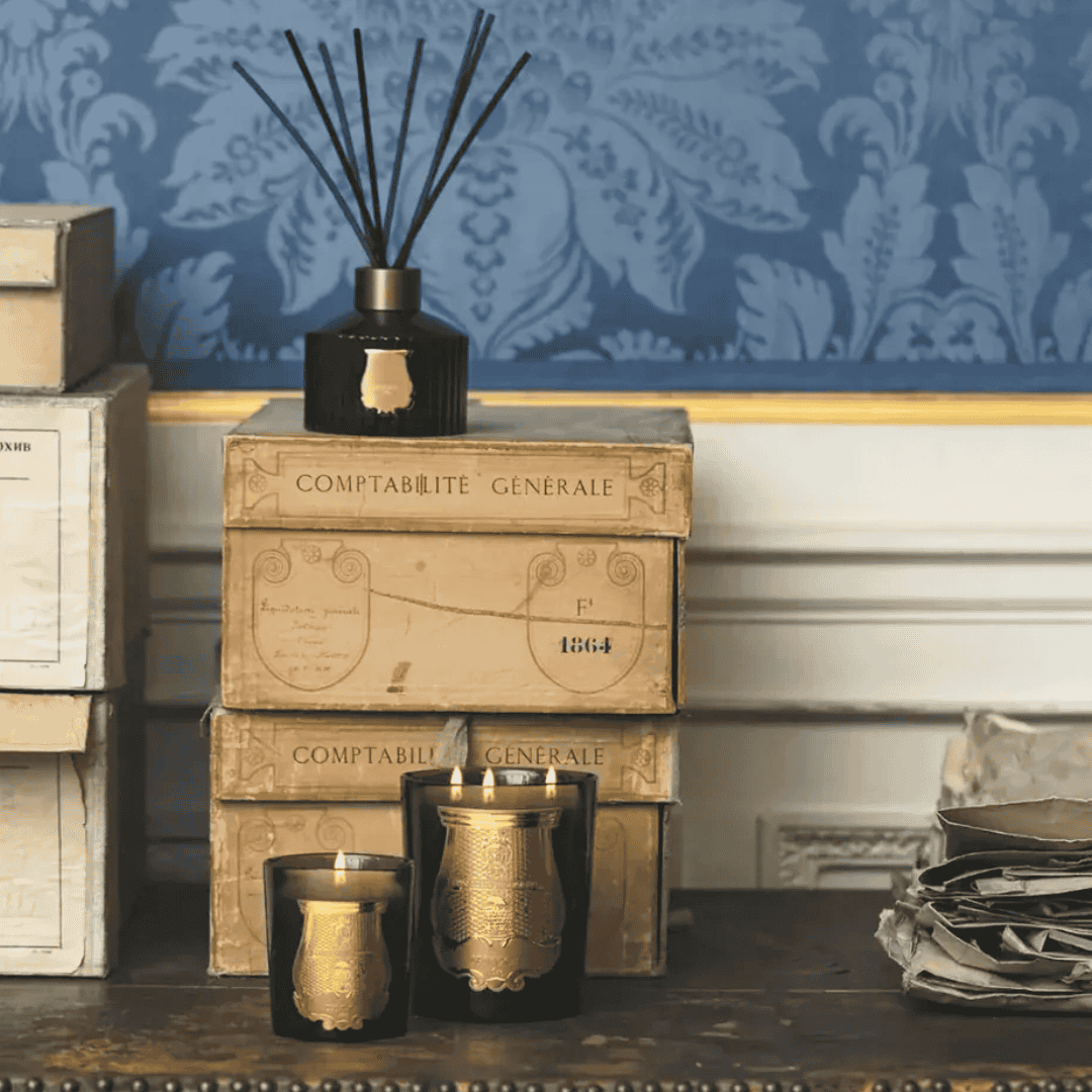 Trudon Raumdüfte mit brennenden Kerzen