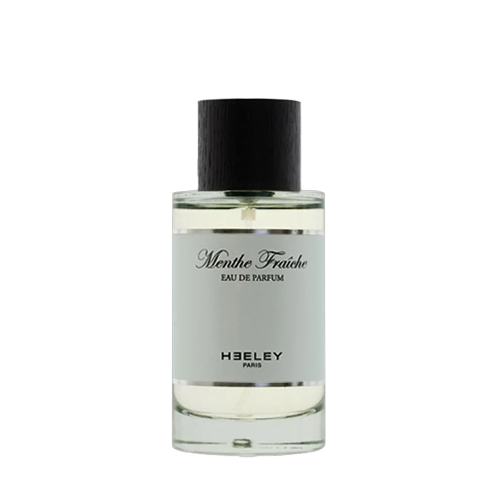 Parfümflasche Menthe Fraîche von Heeley mit schwarzem Verschluss und klarer Flüssigkeit, "Eau de Parfum" Aufschrift.