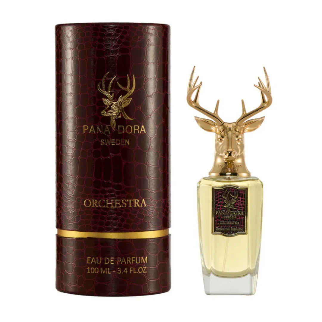 Parfümflakon "Orchestra" von Pana Dora mit goldenem Hirschkopf als Verschluss, neben zylindrischer Verpackung.