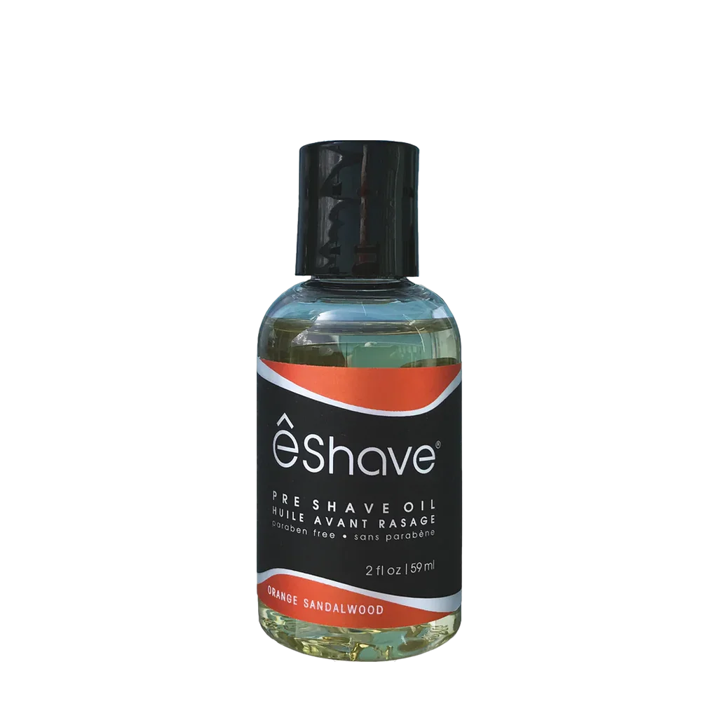 Pre Shave Oil Orange Sandalwood von eShave. Kleine Flasche mit schwarzem Verschluss und bunter Etikettierung.