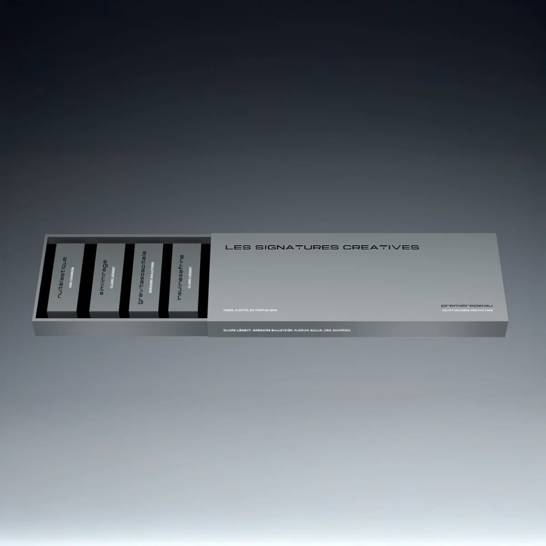 Première Peau Discovery Coffret Extrait de Parfum – geöffnete Box von oben mit Proben, stilvolle Präsentation bei scent amor