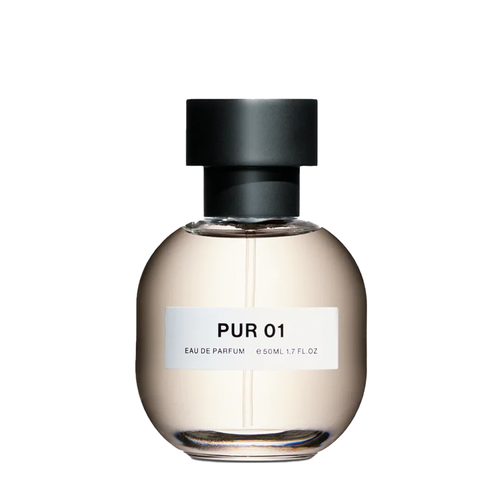 Parfumflakon "PUR 01" von SON VENÏN, mit rundem, transparentem Glas und schwarzem Verschluss.