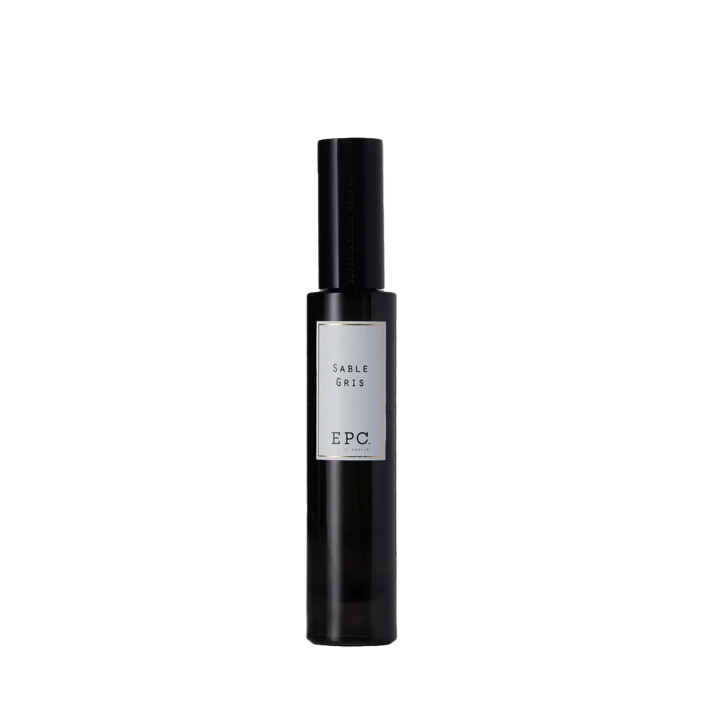 Schwarze Parfümflasche mit weißem Etikett "Sable Gris" von Experimental Perfume Club, zylindrische Form.
