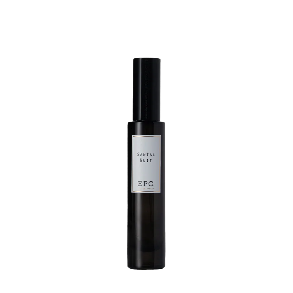 Parfümflasche "Santal Nuit" von Experimental Perfume Club, schlankes Design, schwarzes Glas mit silbernem Etikett.