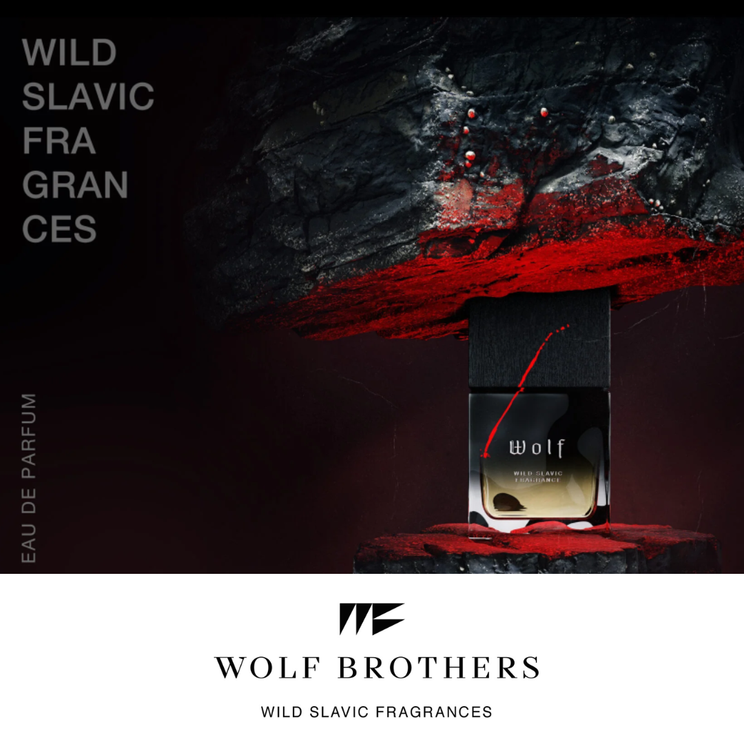Mood Image für das Parfum Wolf der polnischen Marke Wolf Brothers Flakon vor dunklem Stein rot angeleuchtet