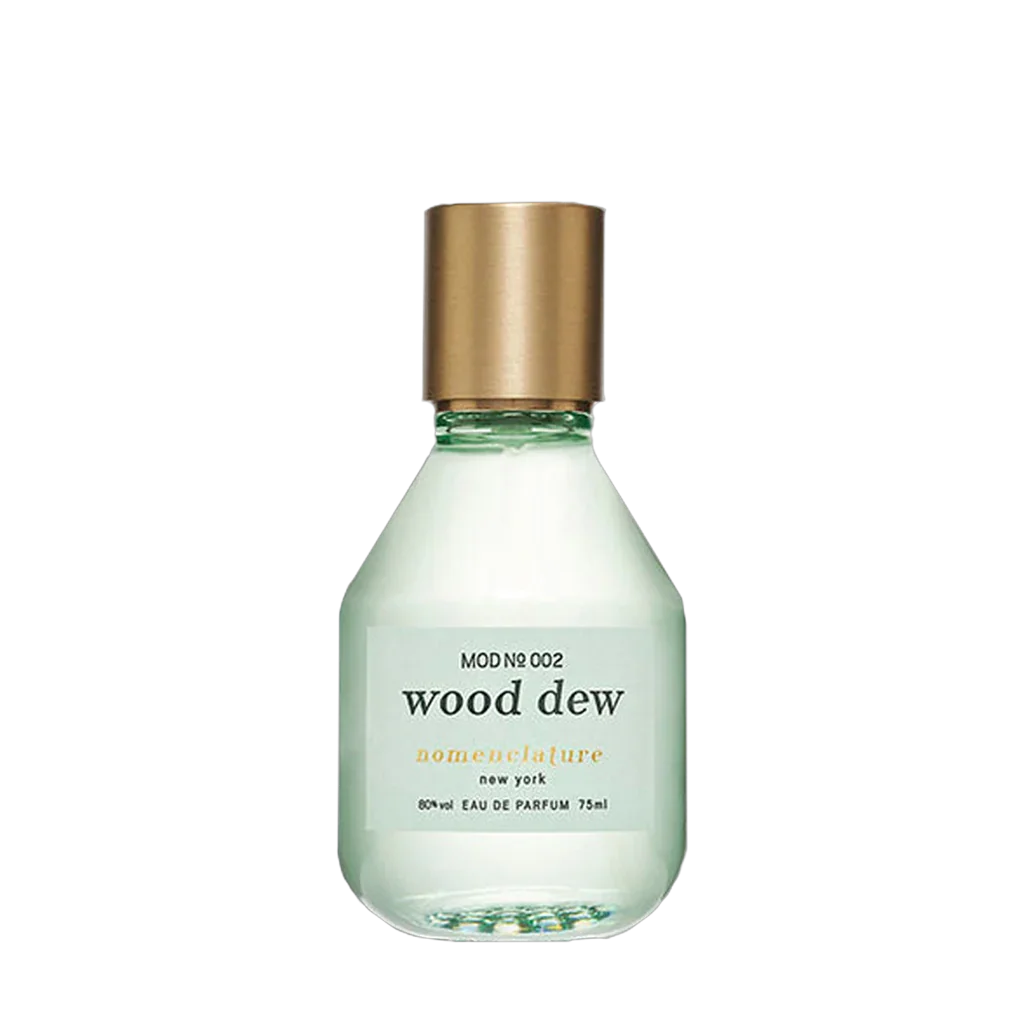 Transparente Glasflasche mit goldener Kappe, "wood dew" von Nomenclature, 60 ml Eau de Parfum.