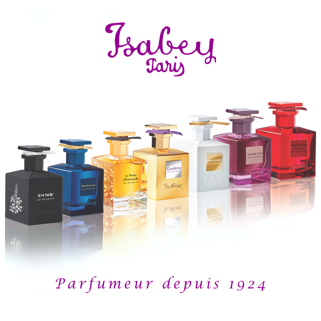 Sieben bunte Parfümflaschen von Isabey Paris in einer Reihe, darunter "Parfumeur depuis 1924".