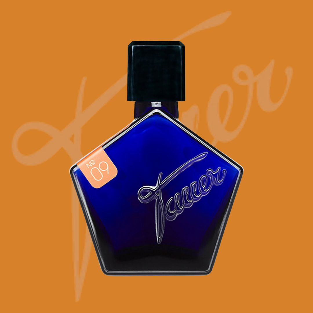 tauer perfumes orange star flakon auf orangenem hintergrund mit logo