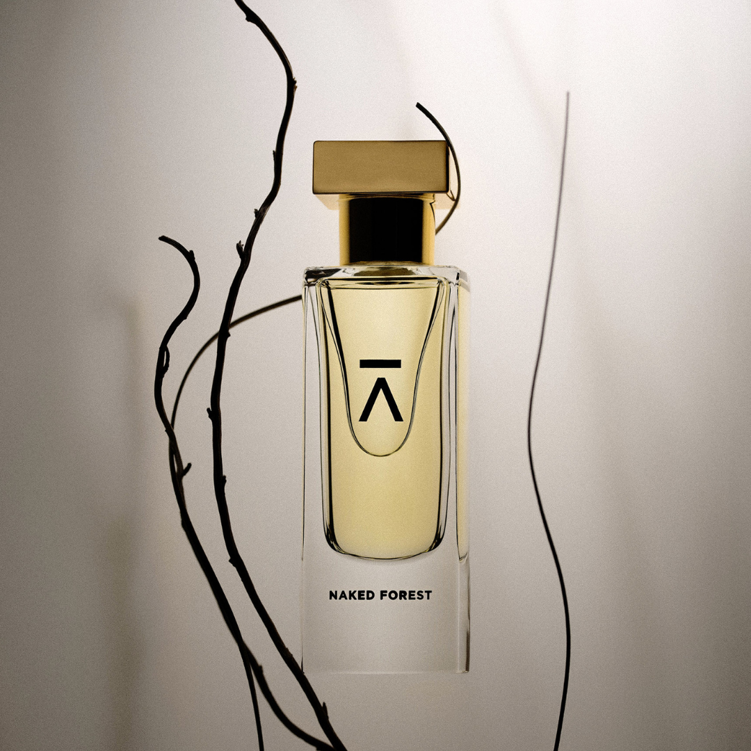 Azman Perfumes Naked Forest Extrait de Parfum Flakon mit Zweigen gruppiert scent amor
