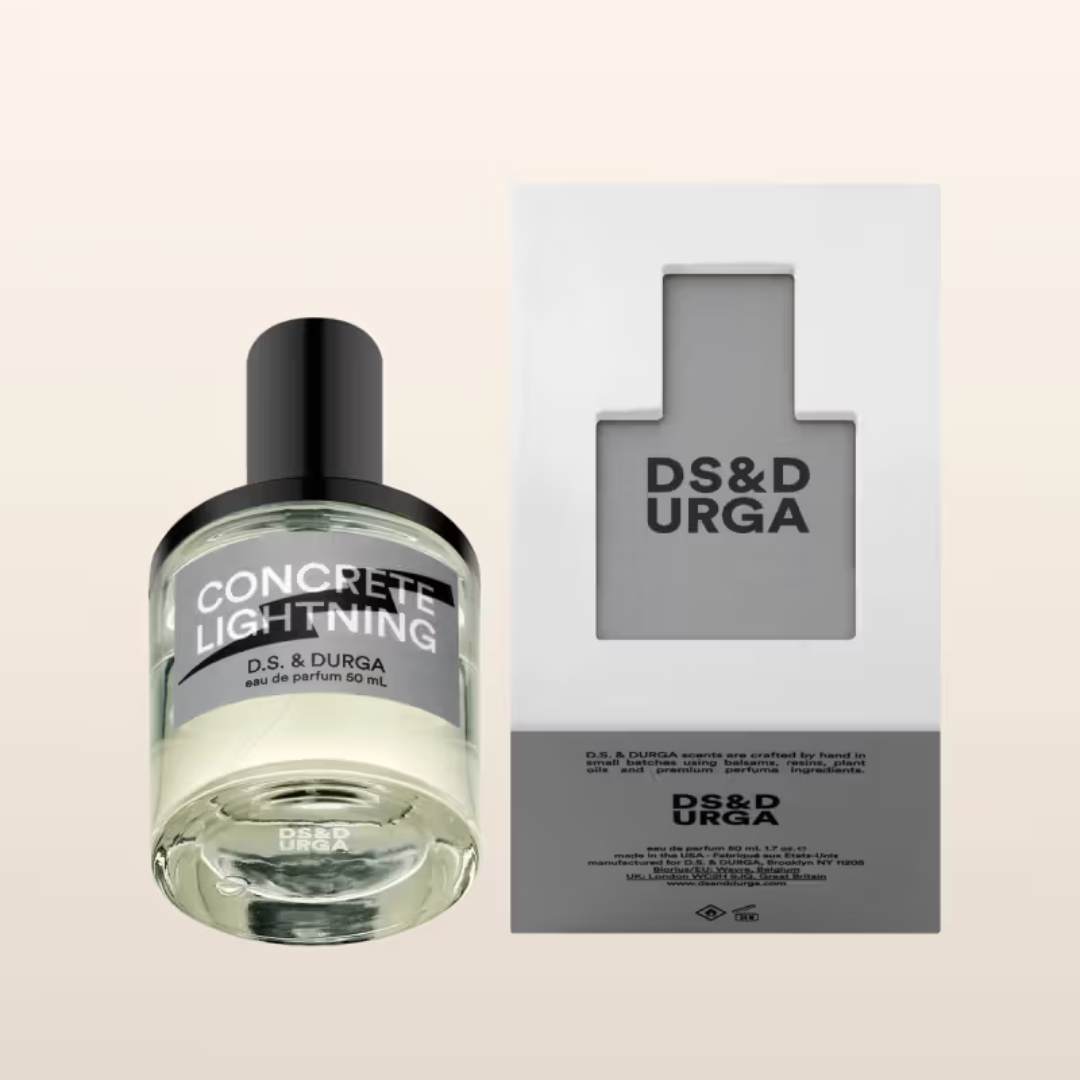 D.S. & Durga Concrete Lightning Eau de Parfum mit Verpackung, moderner Duft mit frischen, metallischen Akzenten, stilvoll präsentiert neben der Box, erhältlich bei scent amor