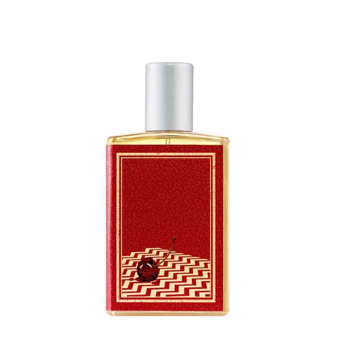 Imaginary Authors A Little Secret Eau de Parfum, roter Flakon mit Kirschmotiv und grafischem Design, verspielt und gourmandig, erhältlich bei scent amor.