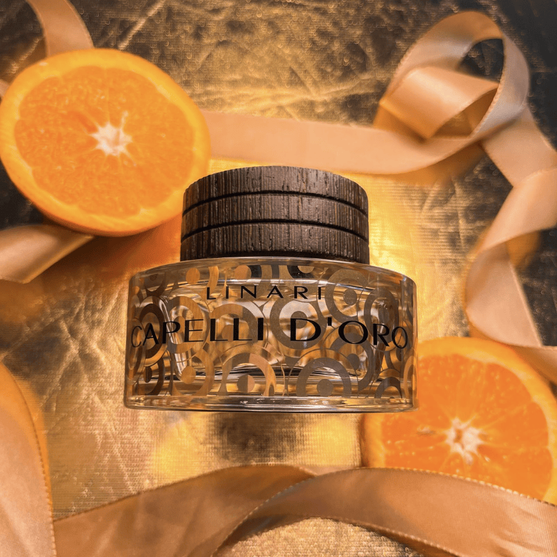 Linari Capelli d’Oro Eau de Parfum, edler Duftflakon mit Orangen und goldenen Akzenten inszeniert, warm und sinnlich, erhältlich bei scent amor.