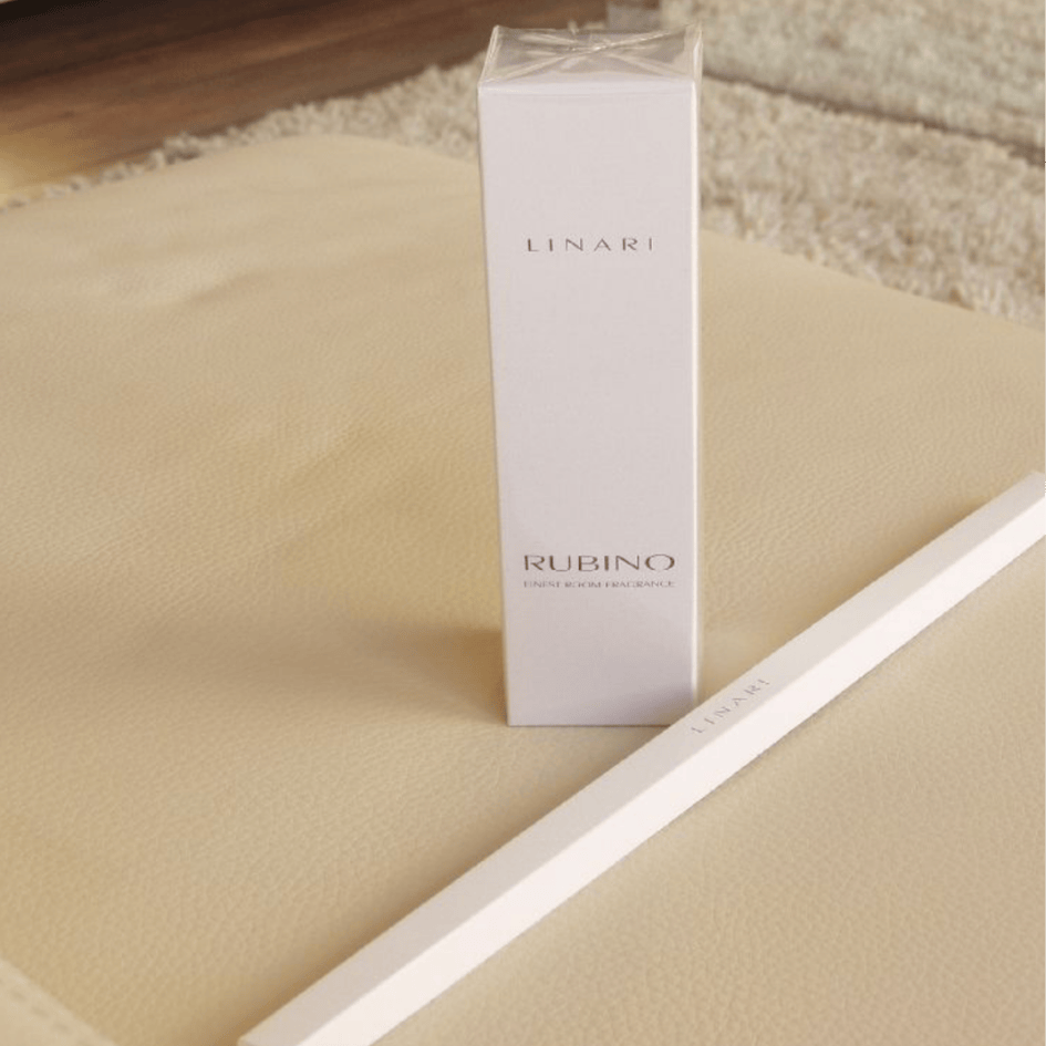 Linari Rubino Diffuser, edle Verpackung mit Duftstäbchen und Raumduft, minimalistisch und hochwertig präsentiert, erhältlich bei scent amor.