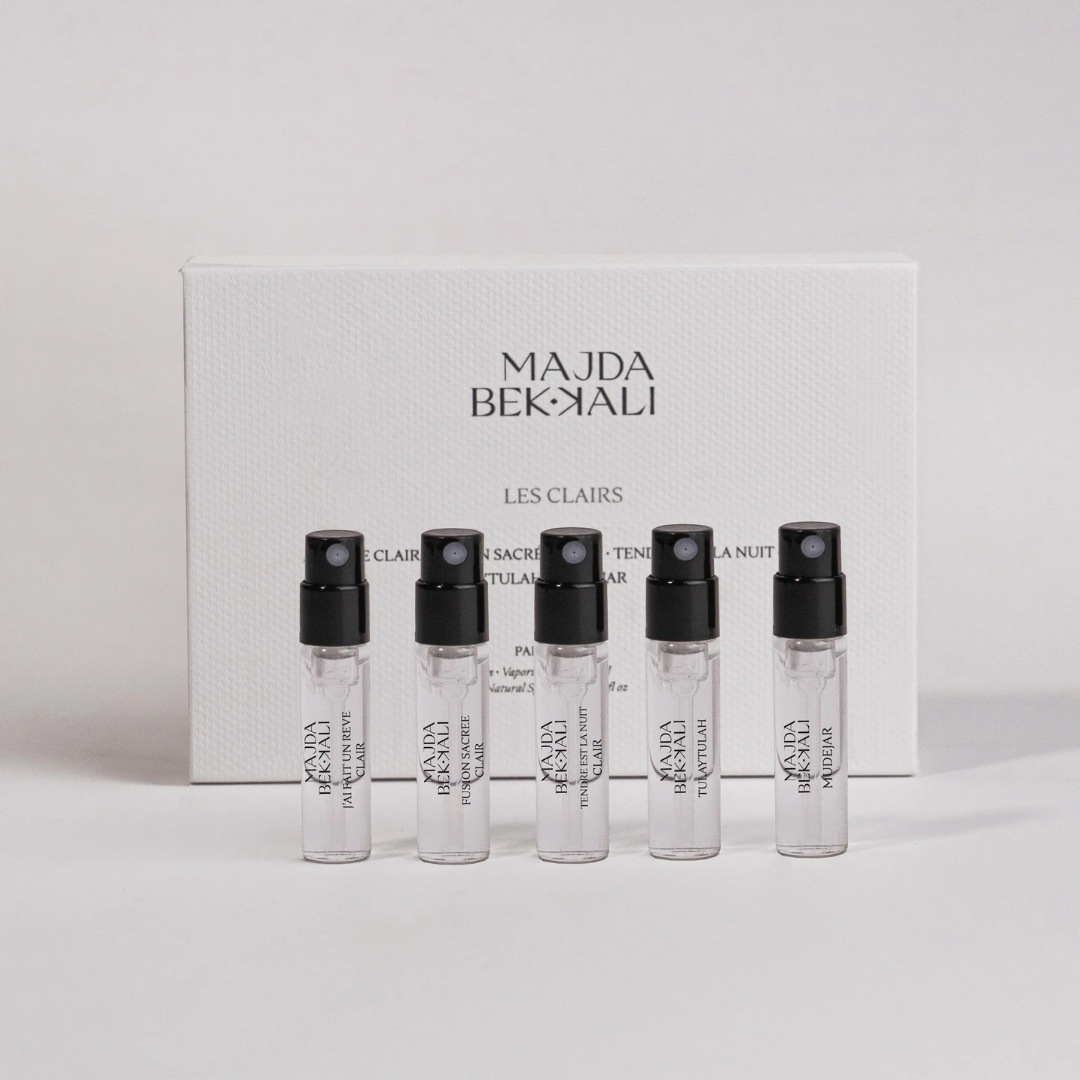 Majda Bekkali Les Clairs Discovery Set, minimalistische Darstellung mit fünf Duftproben und Box, erhältlich bei scent amor